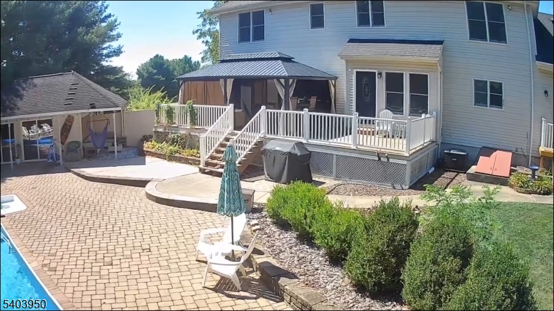 1 Worthington Road Columbia, NJ 07832 - Photo 43 of 50 a view of a patio with table and chairs potted plants