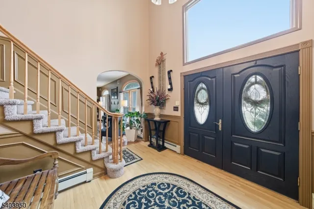 a view of a hallway with washer and dryer