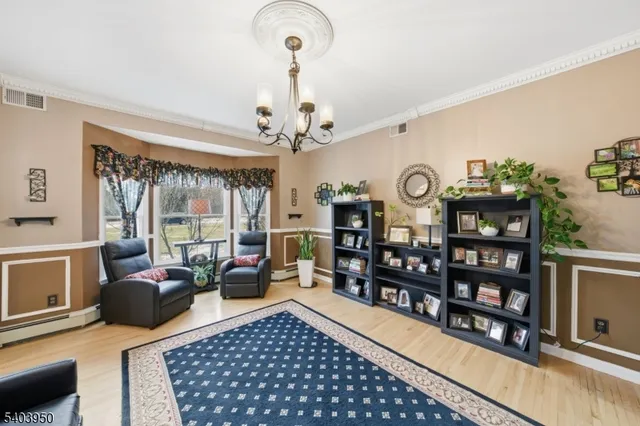 a view of a livingroom with furniture and window