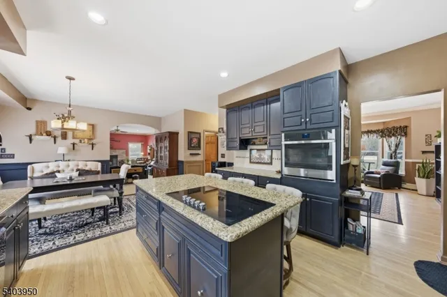 a kitchen that has a sink and a stove