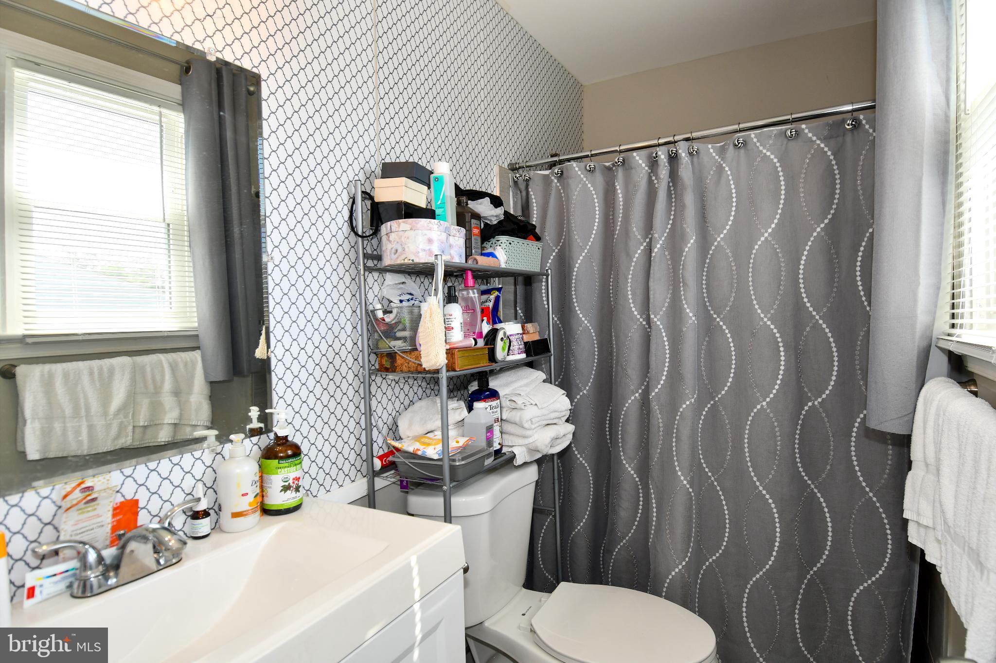 5815 Arbroath Drive Clinton, MD 20735 - Photo 16 of 46 Charming bathroom with modern accents.