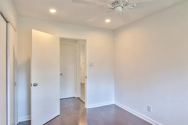 a bathroom with a toilet a sink and a shower