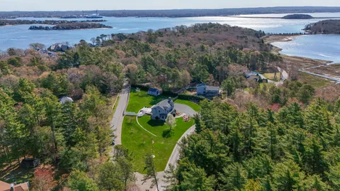 an aerial view of a house with a garden