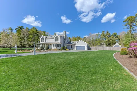 a view of a house with a big yard