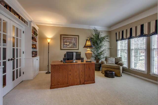 Study/living room with built-ins and gorgeous French doors