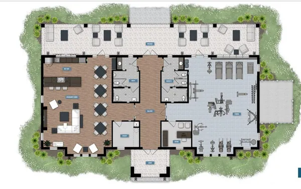 an aerial view of residential houses with outdoor space and parking
