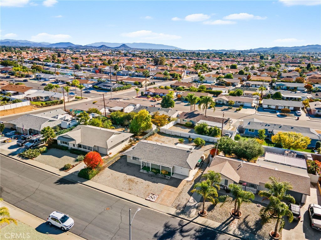 27161 Pinehurst Road Menifee, CA 92586 - Photo 33 of 35 an aerial view of a building with parking