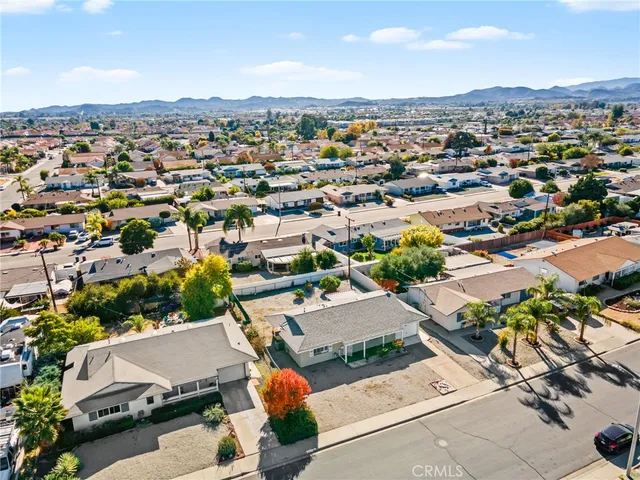 an aerial view of a house with a outdoor space