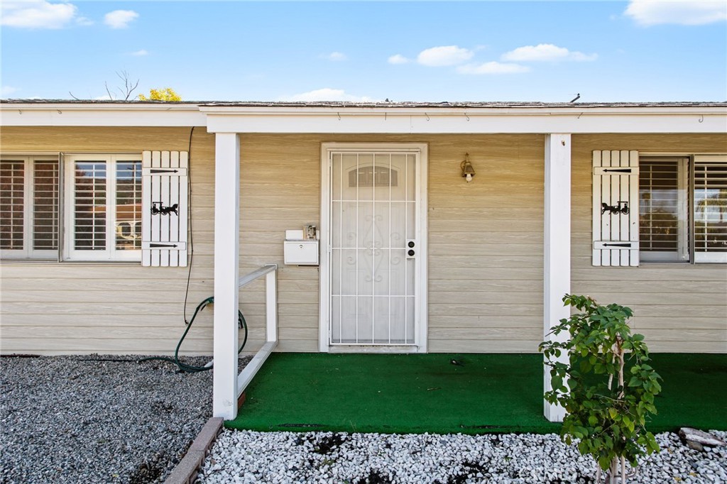 27161 Pinehurst Road Menifee, CA 92586 - Photo 4 of 35 a view of a house with backyard