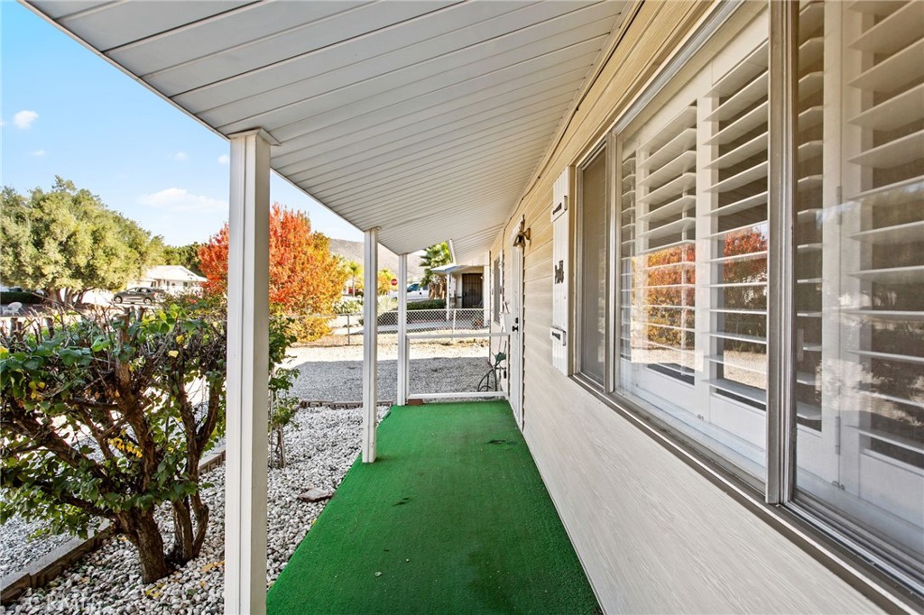 27161 Pinehurst Road Menifee, CA 92586 - Photo 5 of 35 a view of a porch with a yard