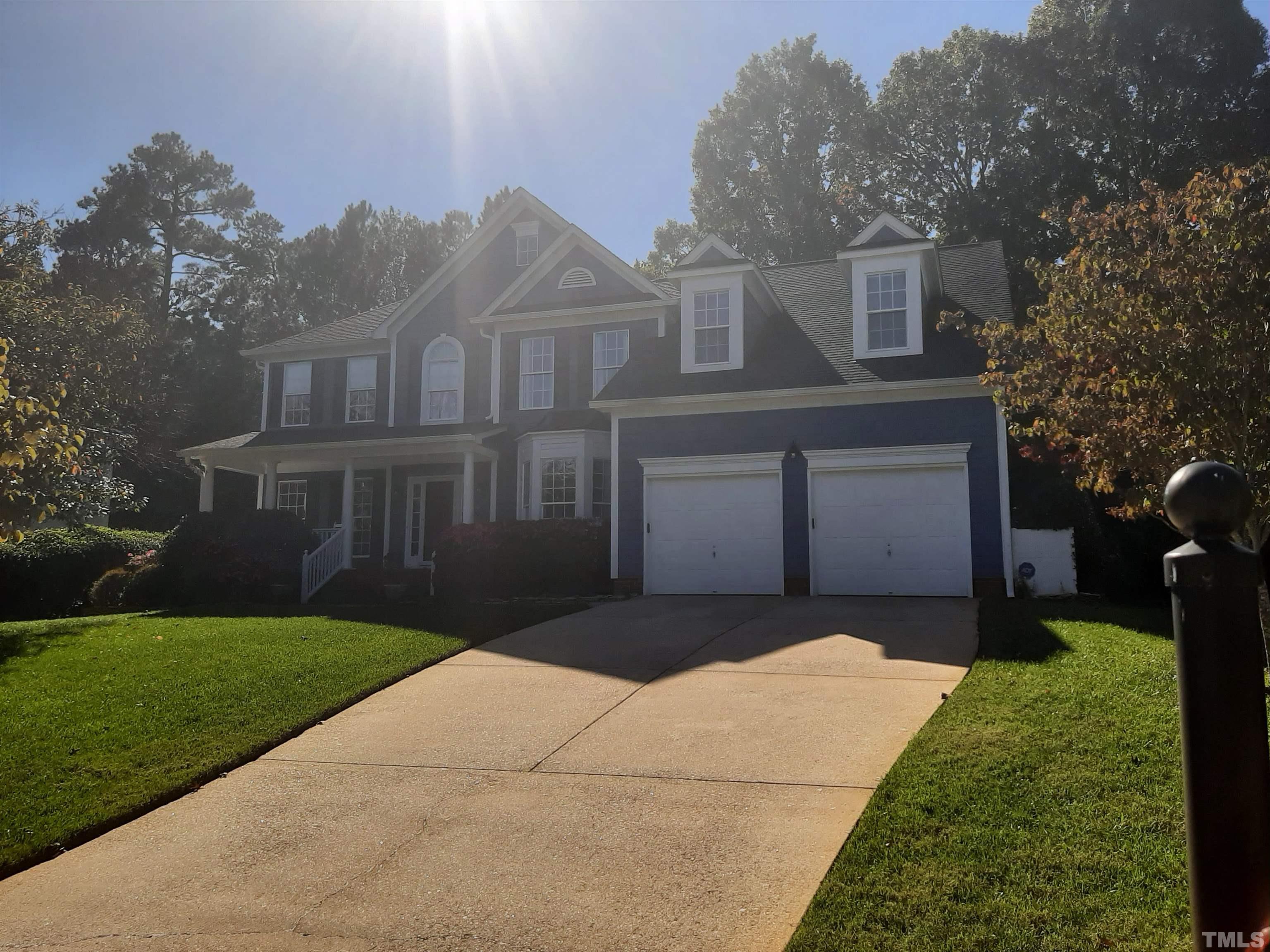 1512 Wood Spring Court Raleigh, NC 27614 - Photo 2 of 39 a front view of a house with a yard