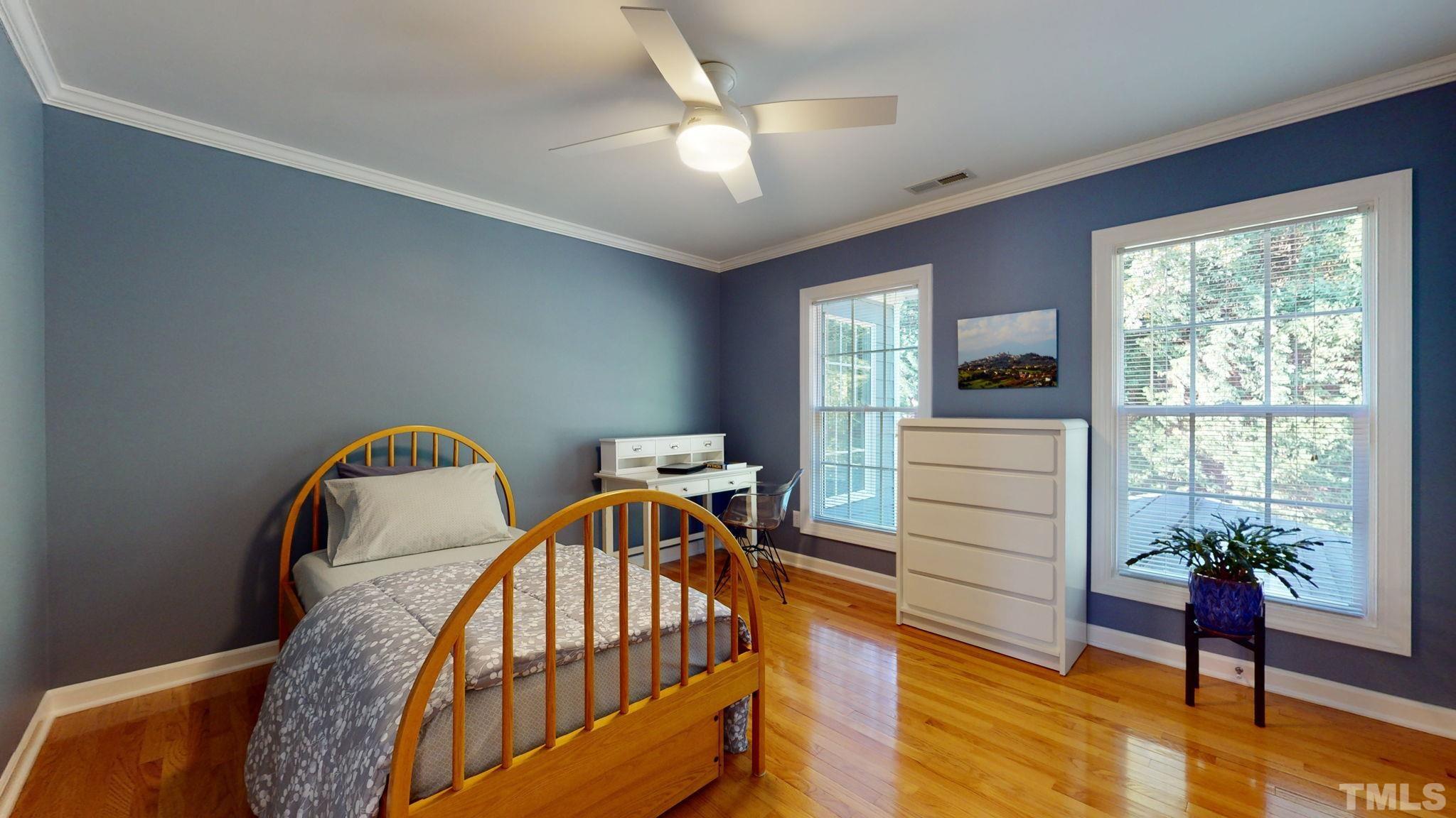 1512 Wood Spring Court Raleigh, NC 27614 - Photo 25 of 39 a bedroom with furniture and a window