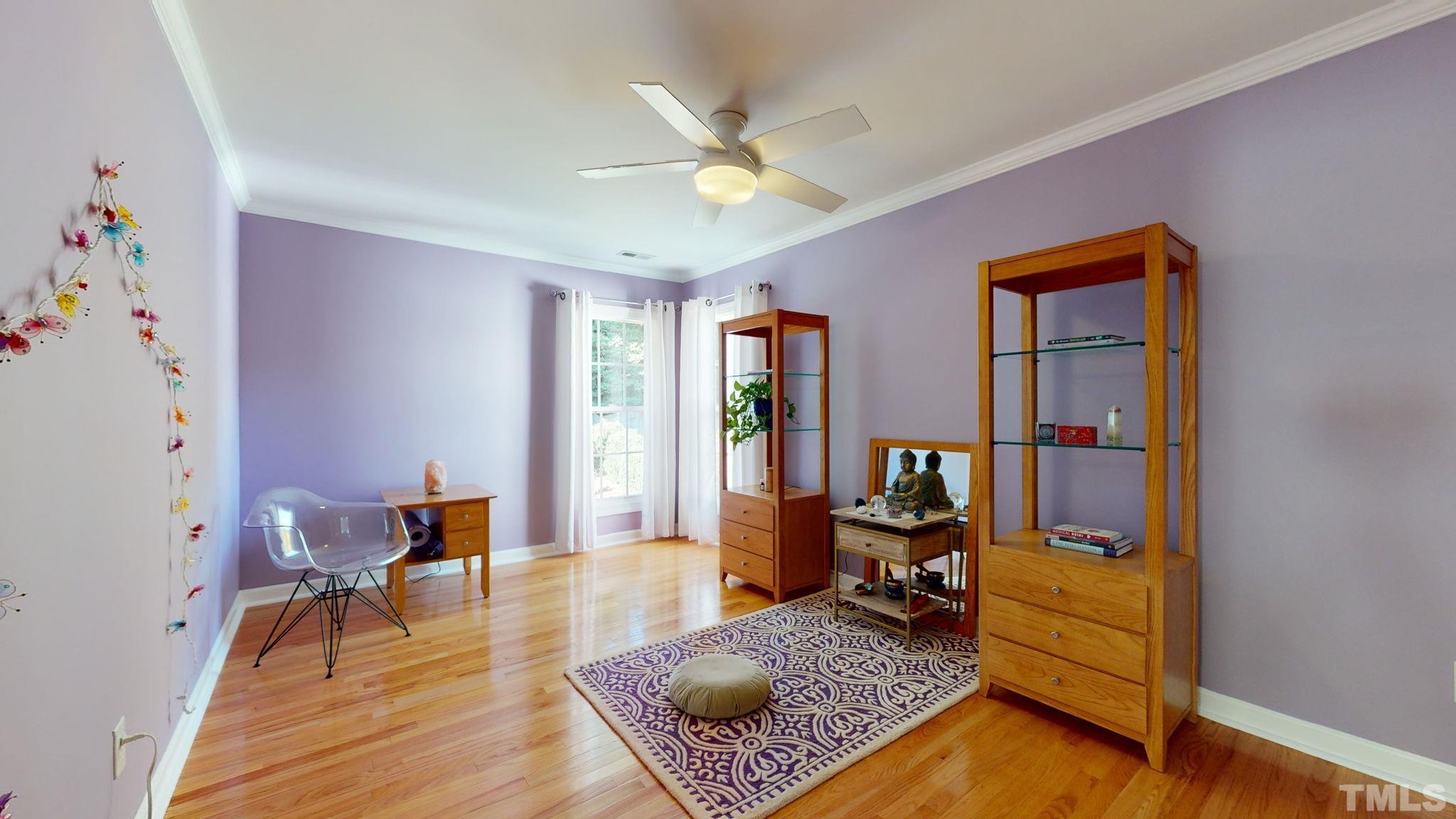 1512 Wood Spring Court Raleigh, NC 27614 - Photo 29 of 39 a living room with furniture and wooden floor
