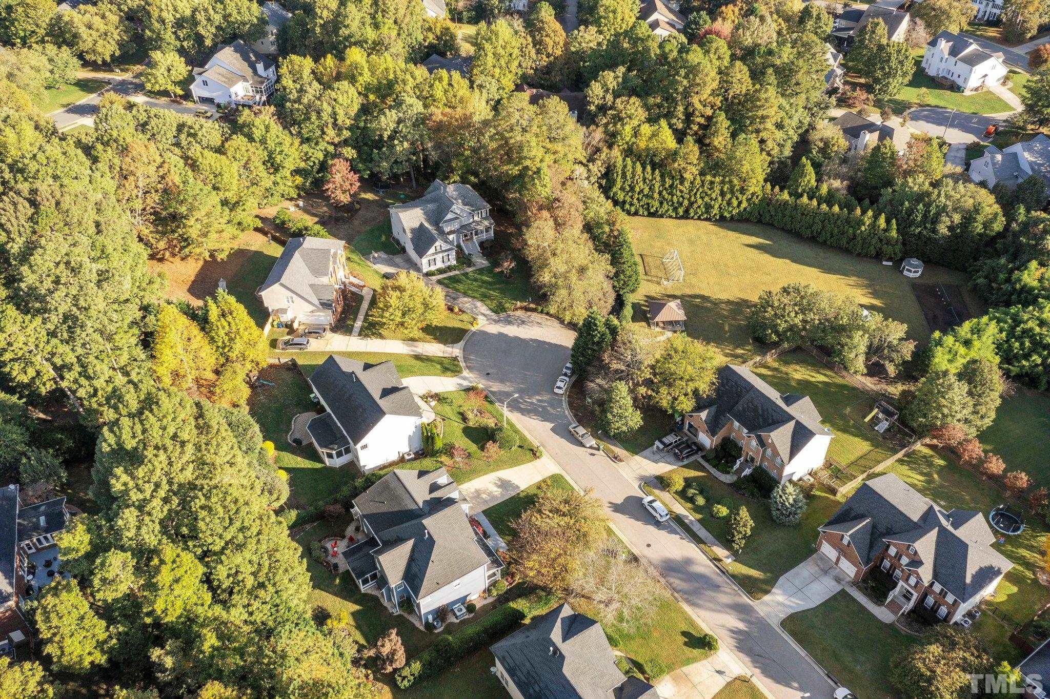 1512 Wood Spring Court Raleigh, NC 27614 - Photo 4 of 39 an aerial view of residential houses with outdoor space