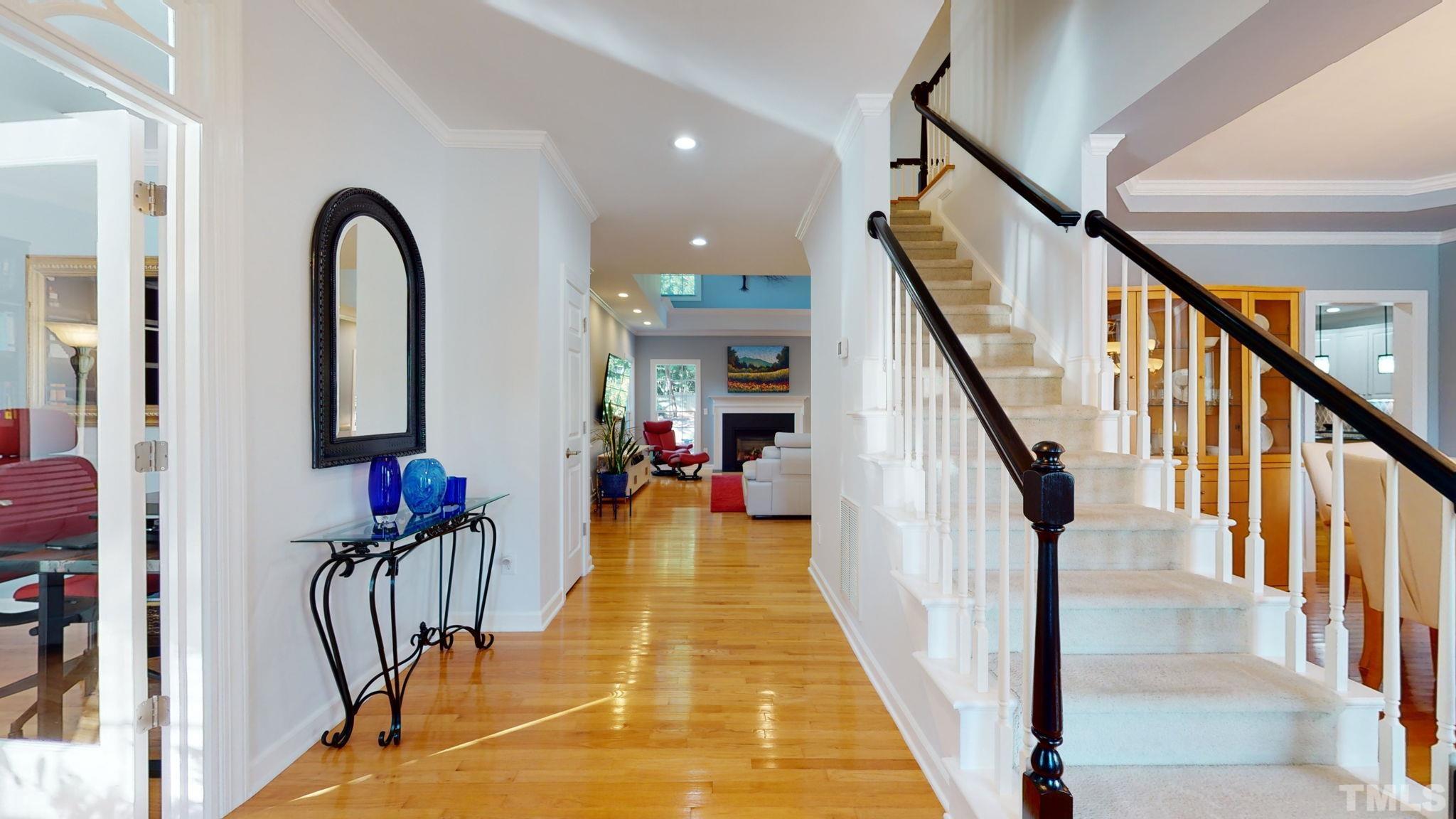 1512 Wood Spring Court Raleigh, NC 27614 - Photo 7 of 39 a view of a hall with an entryway