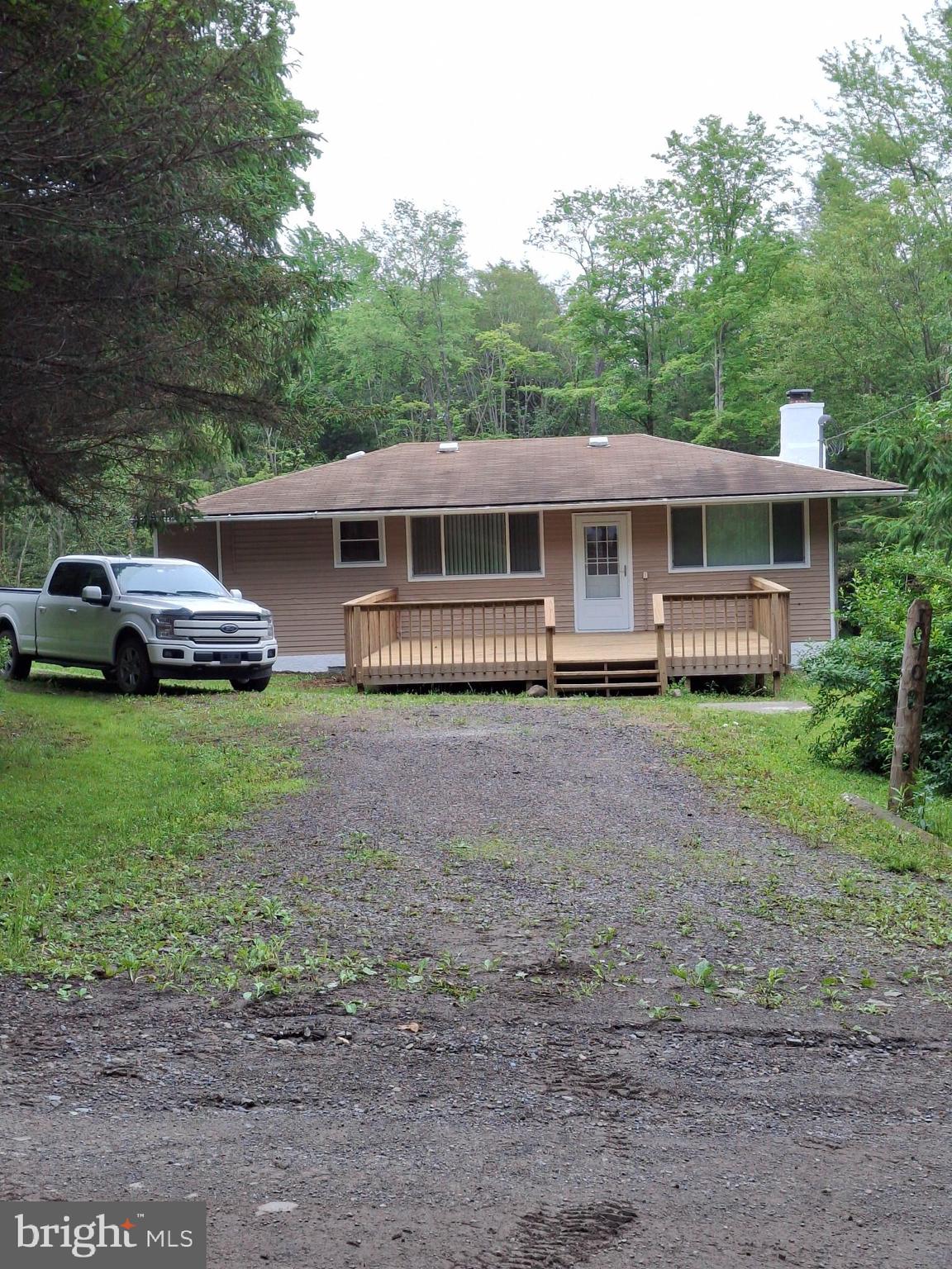 1070 Hayes Road Dushore, PA 18614 - Photo 1 of 23 Front View/Deck