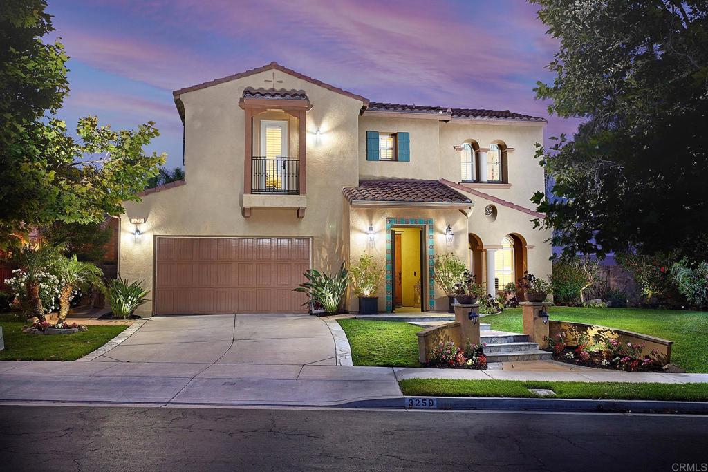 3259 Sitio Tortuga Carlsbad, CA 92009 - Photo 1 of 1 a front view of a house with garden