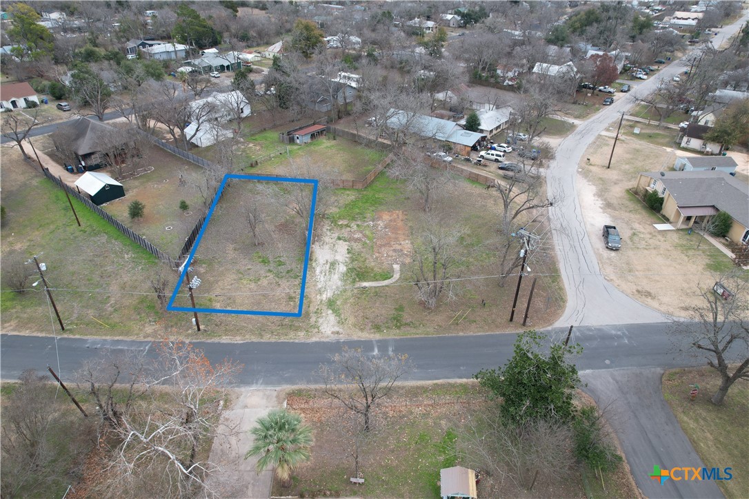 305 B Lexington Road Elgin, TX 78621 - Photo 8 of 10 an aerial view of a house with a yard