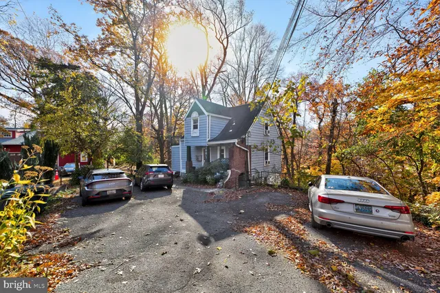 a view of a street with cars
