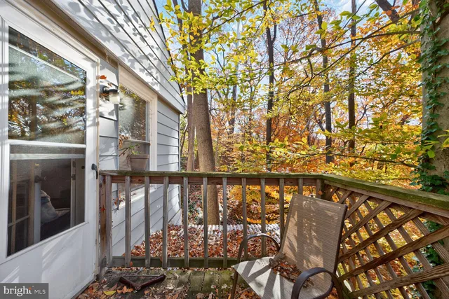 a view of balcony with furniture