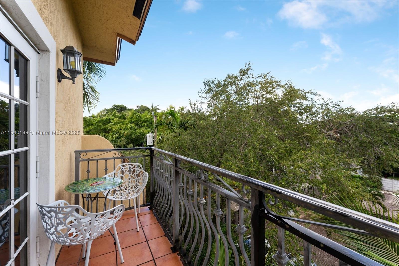 2919 Coconut Avenue, Unit 1 Miami, FL 33133 - Photo 19 of 31 Balcony off Primary Bedroom