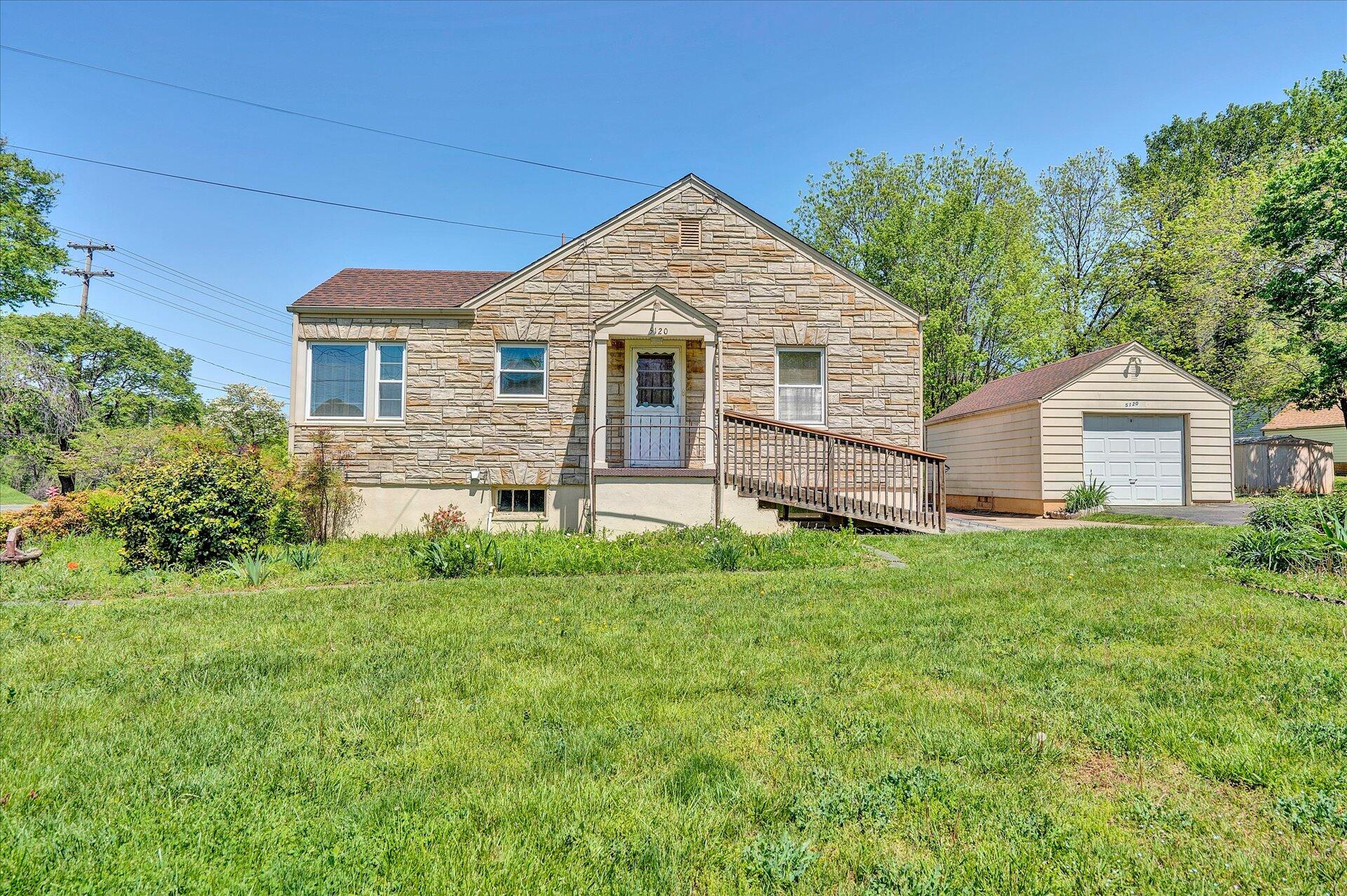 5120 Starkey Road Roanoke, VA 24018 - Photo 17 of 17 a view of a house with backyard and garden