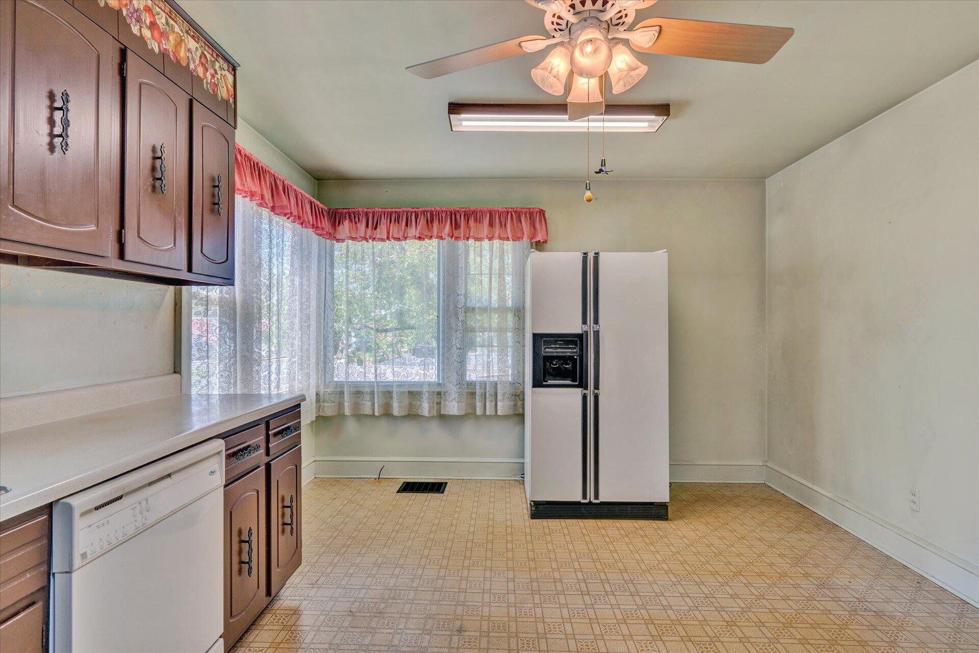 5120 Starkey Road Roanoke, VA 24018 - Photo 7 of 17 a view of kitchen with refrigerator and window