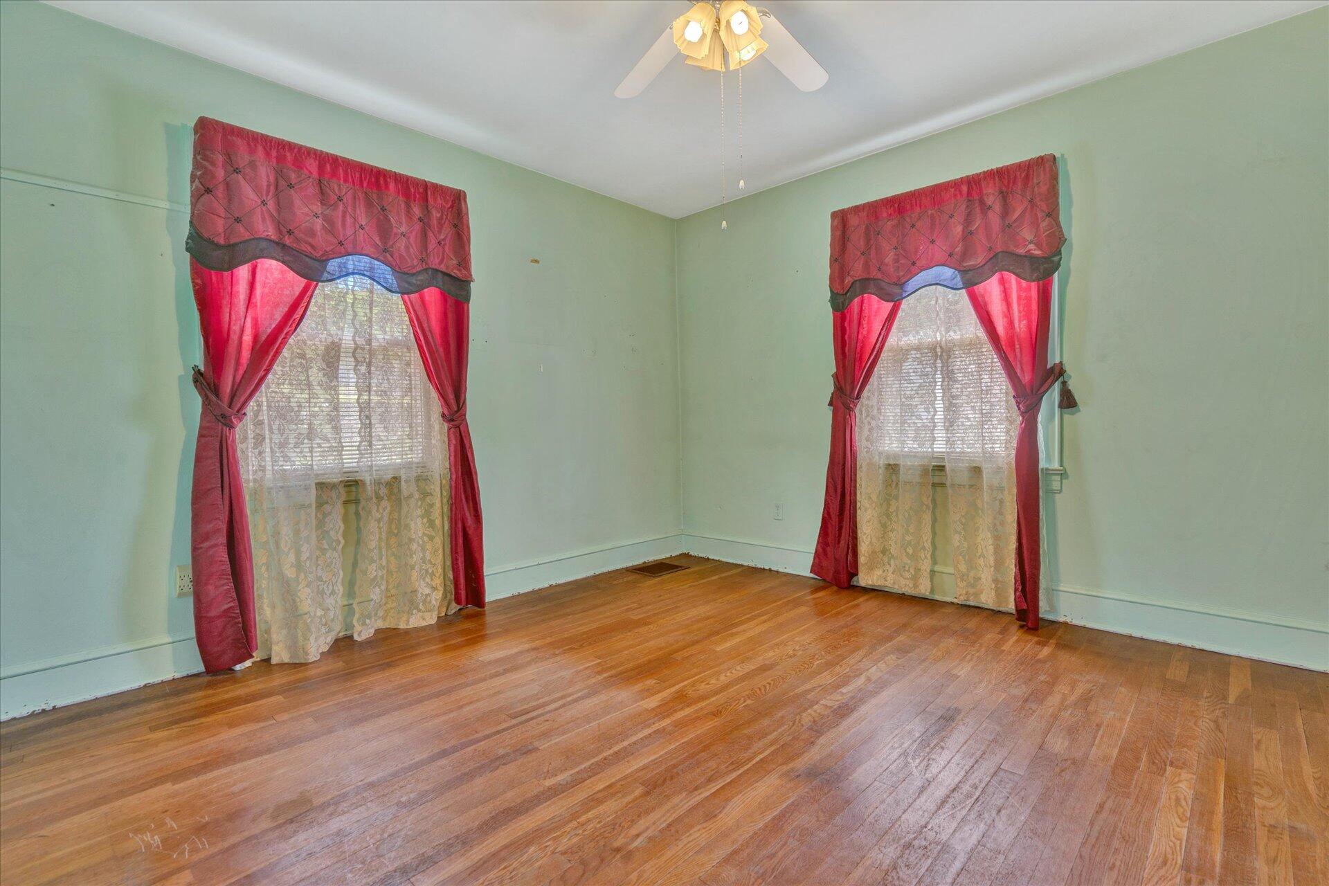 5120 Starkey Road Roanoke, VA 24018 - Photo 10 of 17 a view of a room with wooden floor and a window