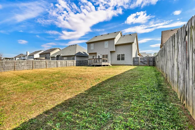 a view of a house with a swimming pool