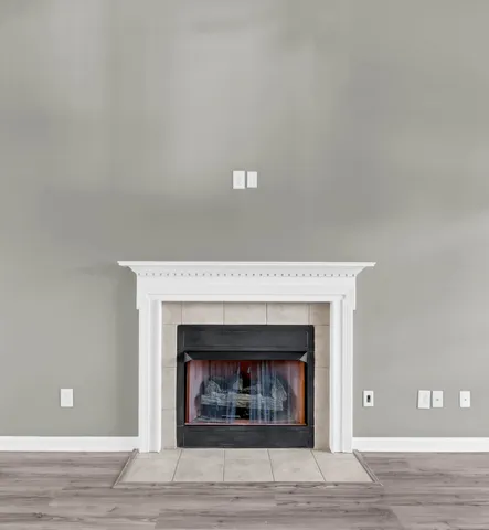 a white building with a fireplace