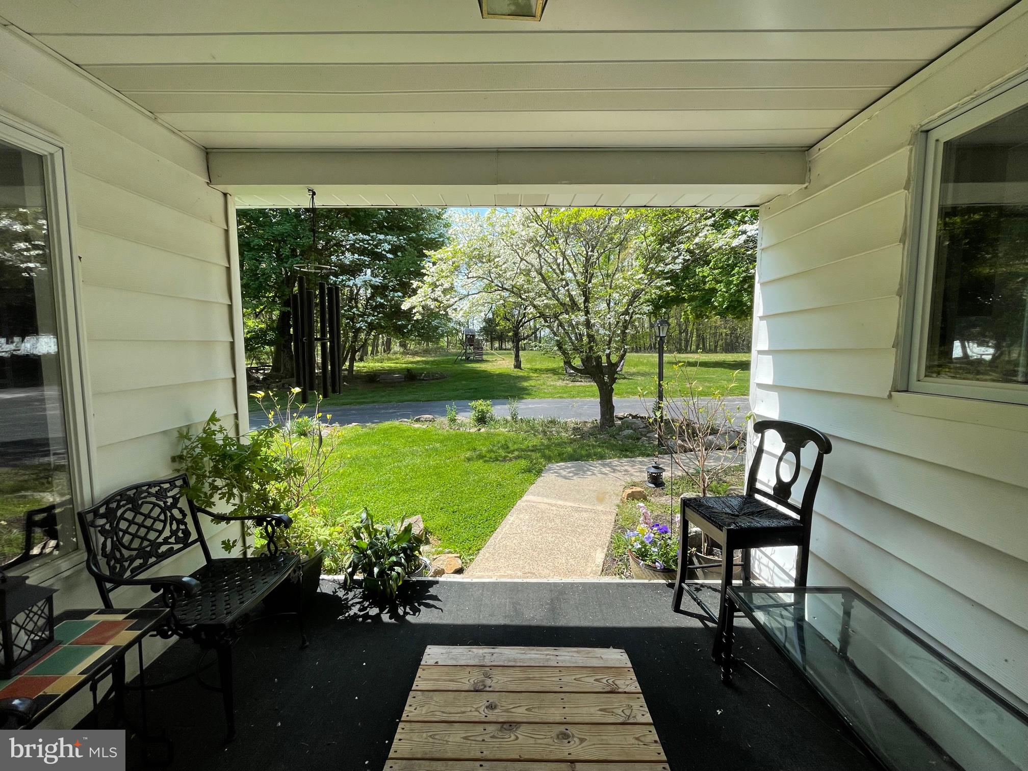 120 Diamond Rock Road Phoenixville, PA 19460 - Photo 36 of 86 Main House front Porch w/ sunset views