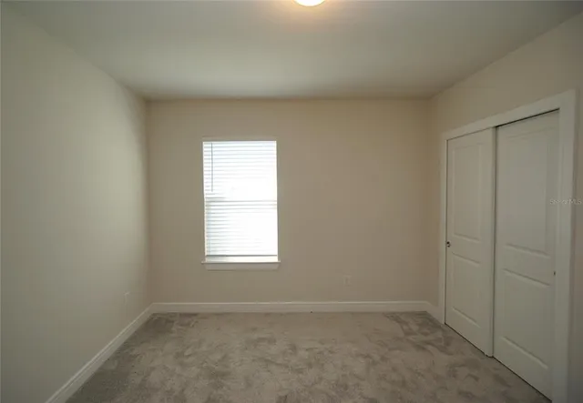 an empty room with closet