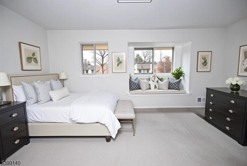 102 Chelsea Way Bridgewater, NJ 08807 - Photo 15 of 28 a spacious bedroom with a bed and a window