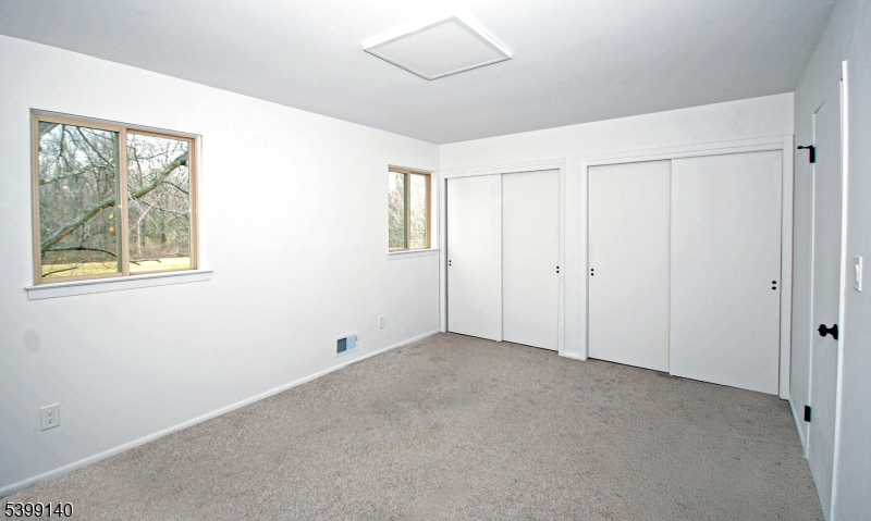 102 Chelsea Way Bridgewater, NJ 08807 - Photo 20 of 28 a view of an empty room with a window