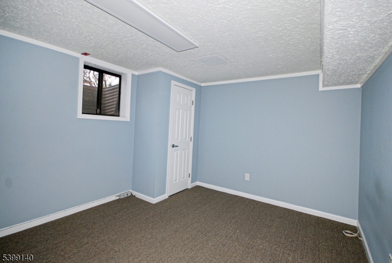 102 Chelsea Way Bridgewater, NJ 08807 - Photo 23 of 28 a view of an empty room with a window