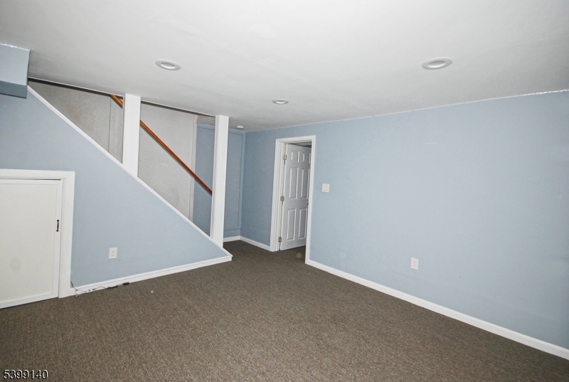 102 Chelsea Way Bridgewater, NJ 08807 - Photo 24 of 28 a view of an empty room with stairs