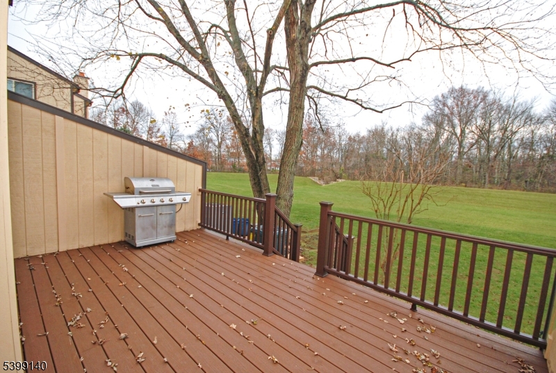 102 Chelsea Way Bridgewater, NJ 08807 - Photo 27 of 28 a view of a balcony with wooden floor and fence