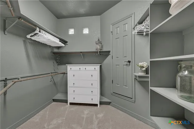 a view of a walk in closet