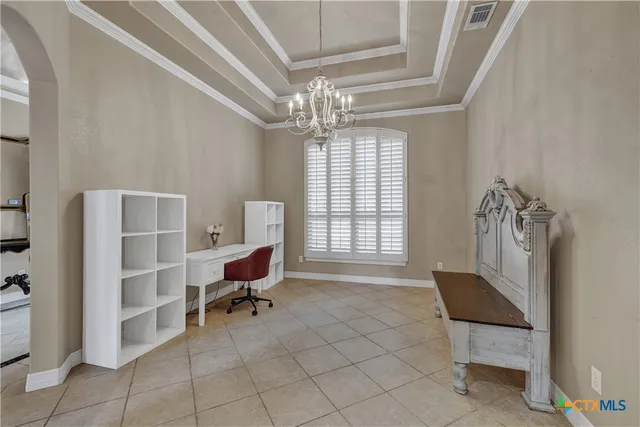 a view of a livingroom with furniture and a window