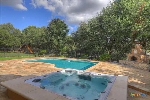 a view of a backyard of a house