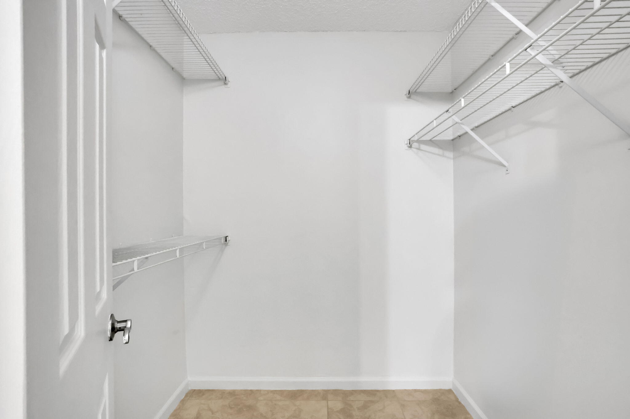 89 Lariat Circle Boca Raton, FL 33487 - Photo 17 of 31 a view of walk in closet