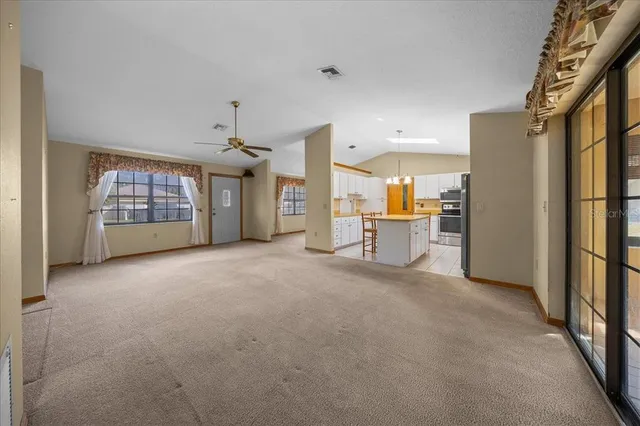 a bathroom with a bathtub a sink and mirror