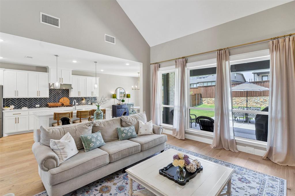 136 Derrett Lane Rhome, TX 76078 - Photo 15 of 40 a living room with furniture and a large window