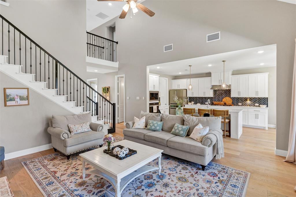 136 Derrett Lane Rhome, TX 76078 - Photo 18 of 40 a living room with furniture kitchen view and a table