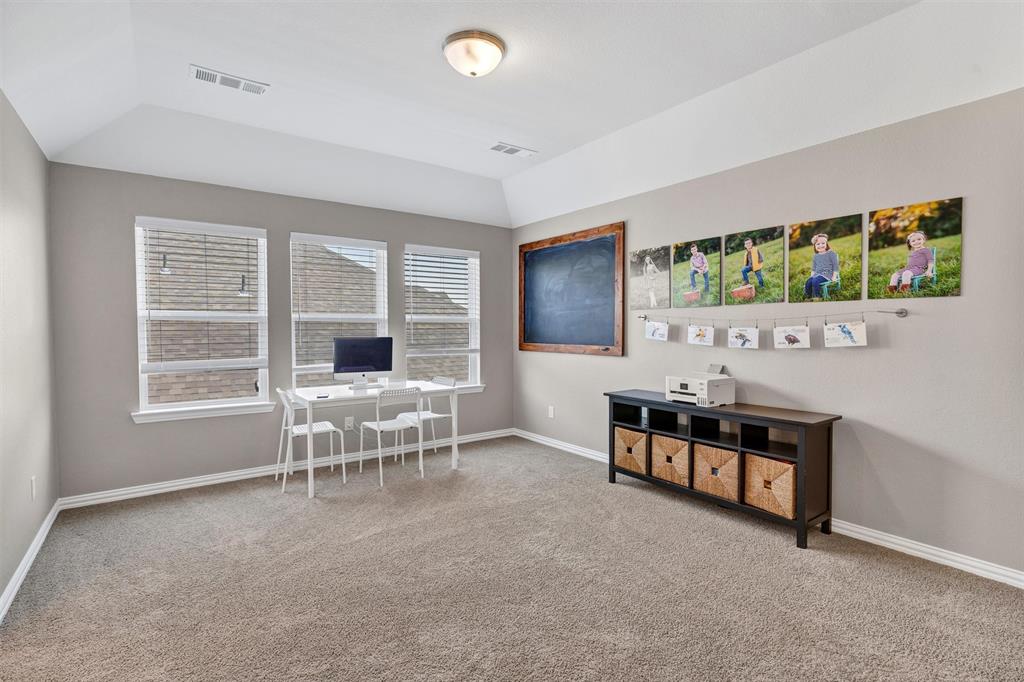 136 Derrett Lane Rhome, TX 76078 - Photo 26 of 40 a work room with furniture and a window
