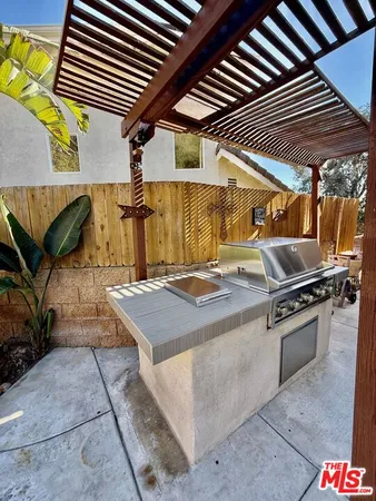 a view of a swimming pool with an outdoor space