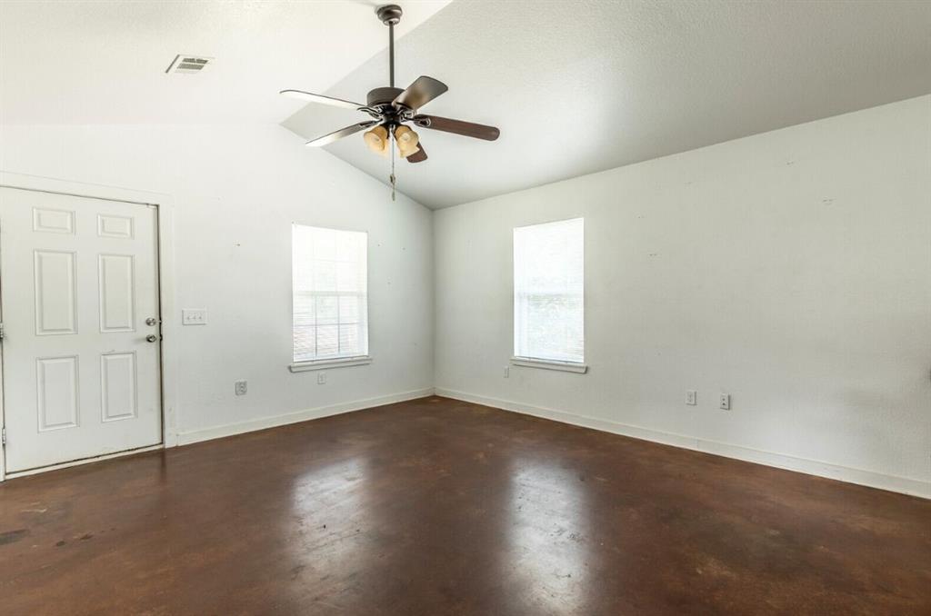 1627 North 9th Street Waco, TX 76707 - Photo 2 of 9 a view of wooden floor and windows in a room