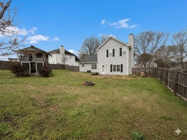 a house view with a outdoor space