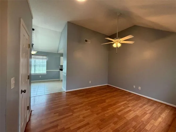 a kitchen with a refrigerator stove microwave and sink