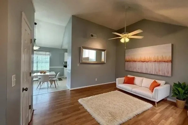 a kitchen with a sink a stove and refrigerator